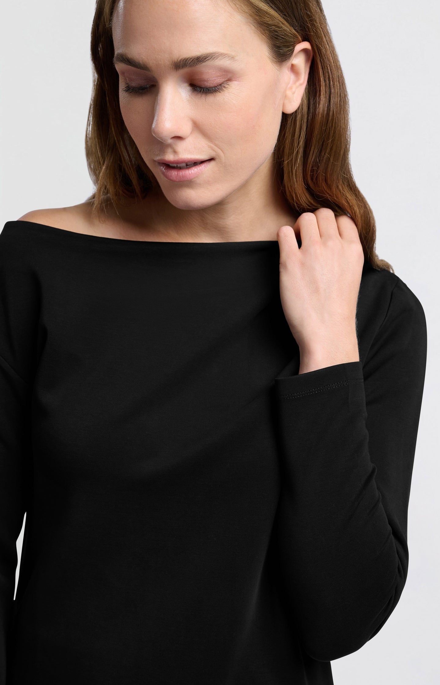 Black off-shoulder dress with long sleeves