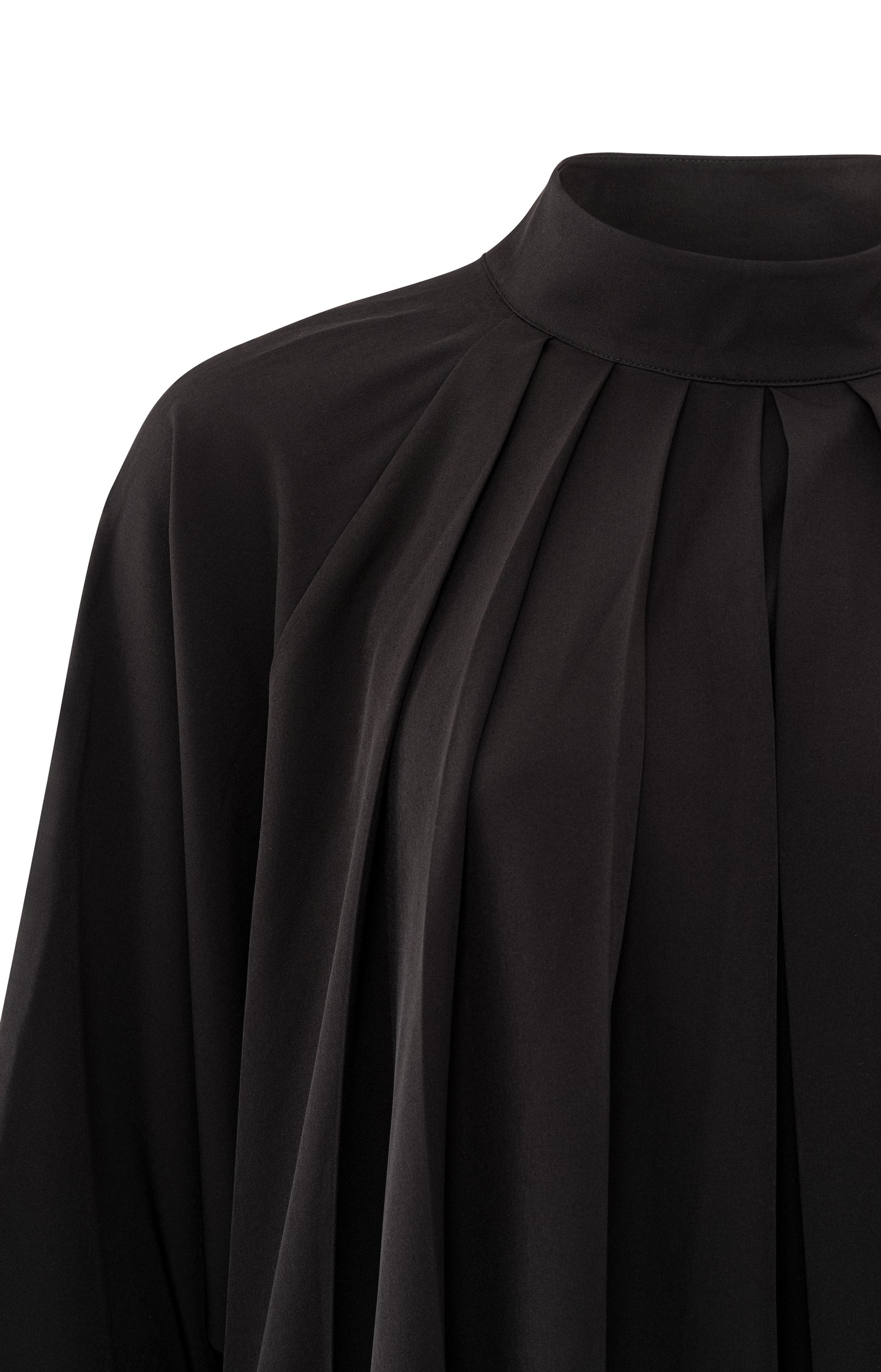 Black top with pleated details and turtleneck